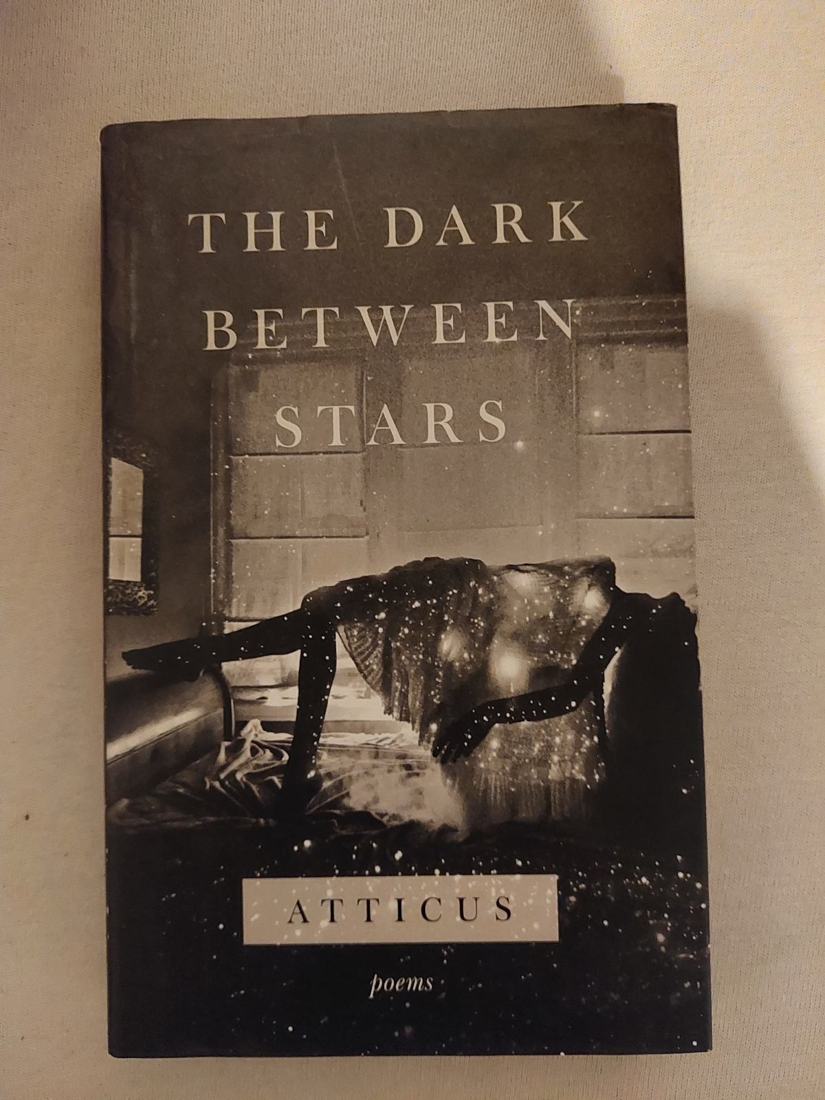 Atticus Dark Between Stars / poezija/ knjiga na engleskom